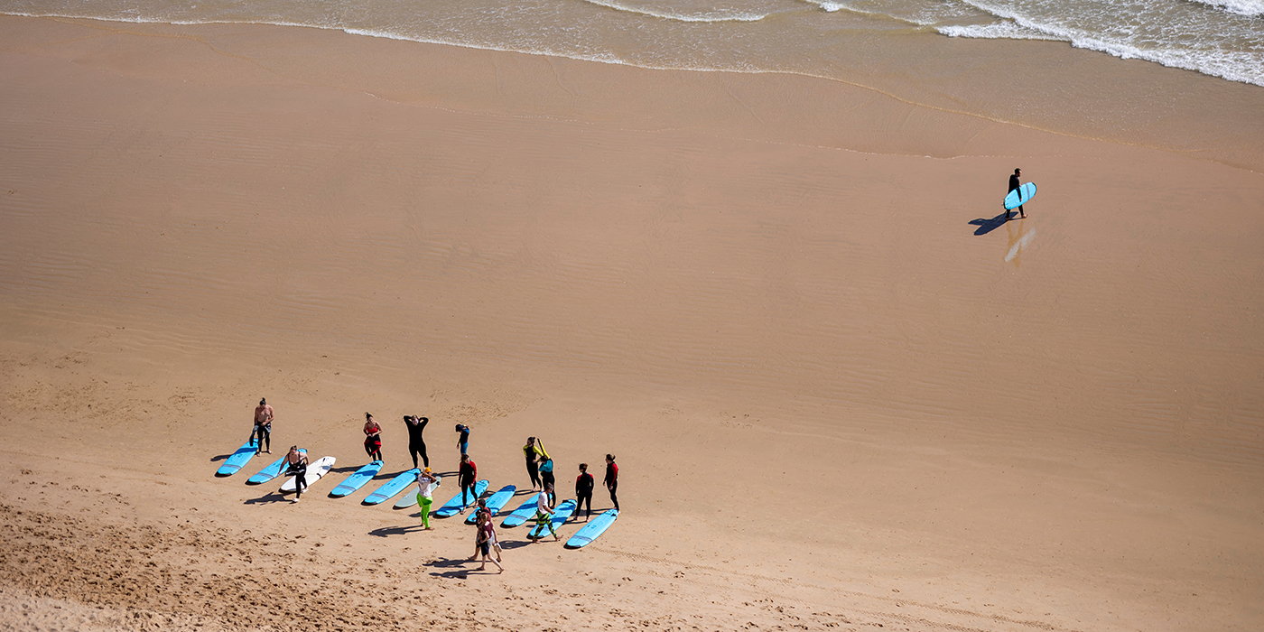 Surf school class lessons in the water
